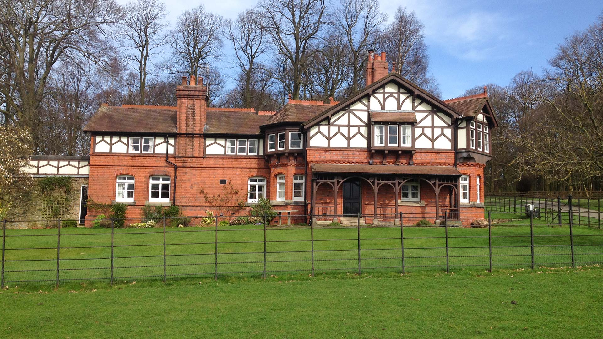 A large detached house with gardens at the front, located on the Knowsley Estate available for renting.